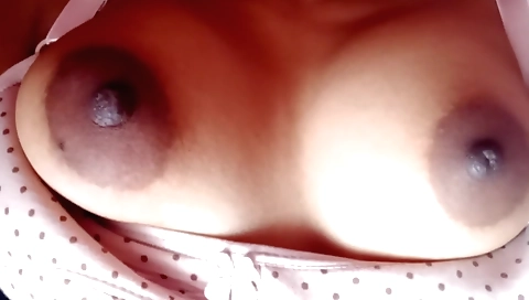 Solo video of the amateur female playing with her hands