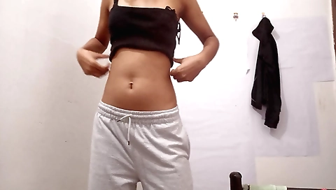 Horny chick in a small bikini dress plays with the little tits