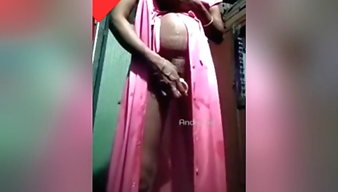 A beautiful teen with a nice ass is filling up her pussy