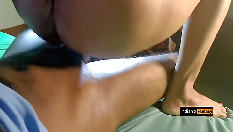 Indian brunette girl receives a blowjob in the kitchen
