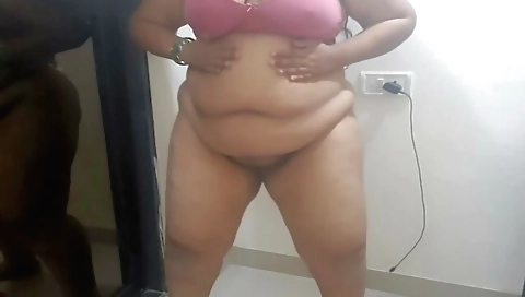 Chubby chick does solo dance on webcam on the floor