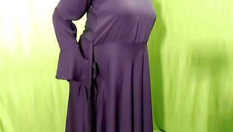 Indian girl in a dress masturbates with her hair and dildo