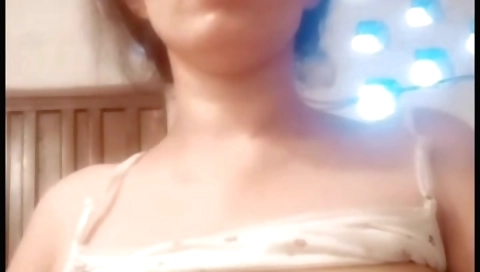 amateur brunette shows her natural boobies on camera