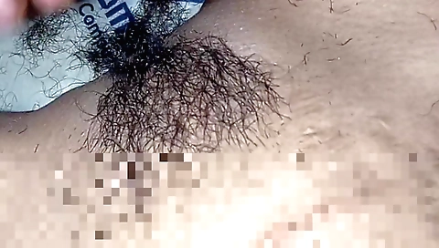 Indian woman giving her hairy pussy a wonderful blowjob