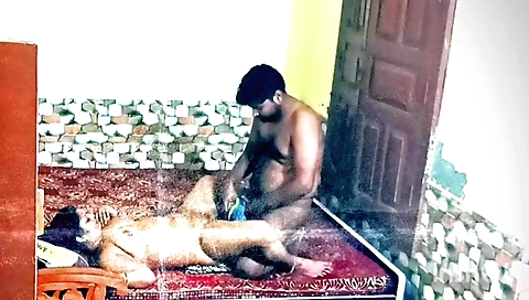 Indian brunette milf fucks her husband on the couch