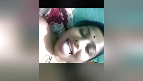 Indian brunette girl is masturbating on her camera