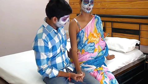 Indian woman is getting dressed in sexy red on a massage