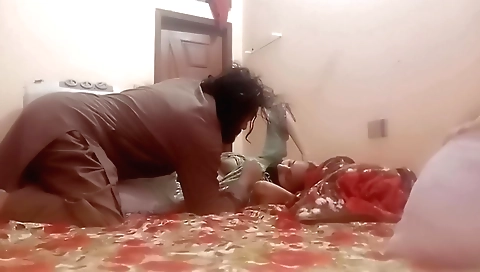 Amateur brunette 18+ is on the knees and fucks two dicks