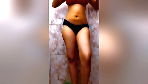 Indian slut in a shower takes off lingerie and fucks