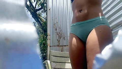 Hot amateur female with a perfect body in the backyard
