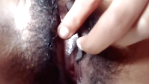Sexy hairy chick is making a solo video for her camera