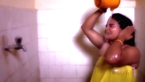 Indian girl with big boobs undresses in hot shower