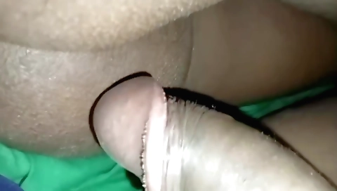 Brunette is riding on her motorcycle on a very hot day