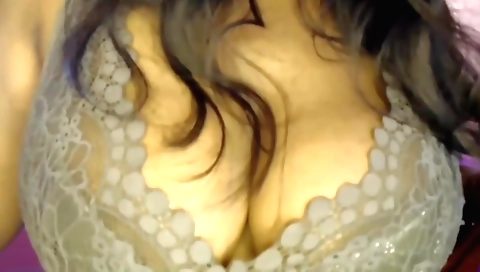 Busty brunette solo girl gives a sexy blowjob and rides