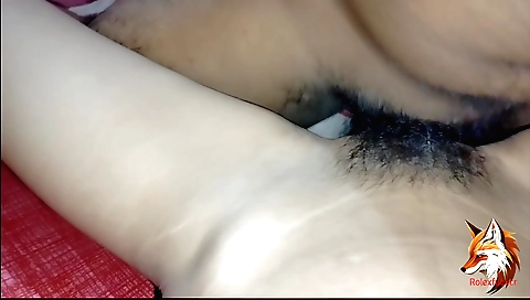 Indian amateur slut in the bed shows her hairy pussy
