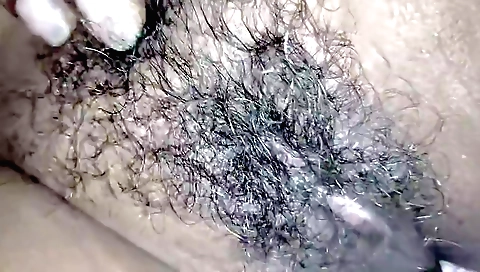Indian wife and her husband share huge hairy pussy