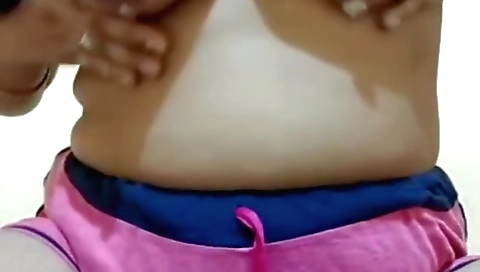 Indian brunette with big tits and ass is showing off