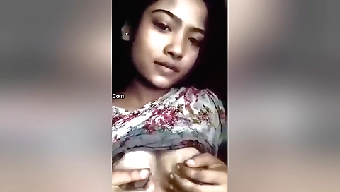 A hot brunette indian woman shows her boobs and curves 2016