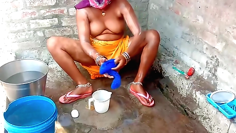 Indian girl showing off her big tits in the shower