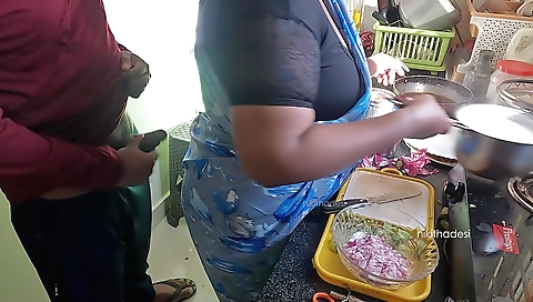 Indian amateur with big boobs jizzing a dick in the kitchen