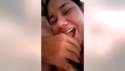 A brunette gets a deepthroat blowjob in front of the camera